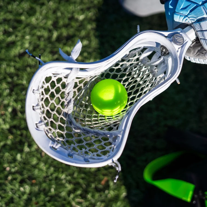A case of 100 PEARL X Lacrosse Balls - Optic Yellow (Fluorescent Game Lacrosse Ball), White, Yellow, Orange