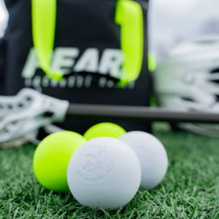 A case of 100 PEARL X Lacrosse Balls - Optic Yellow (Fluorescent Game Lacrosse Ball), White, Yellow, Orange